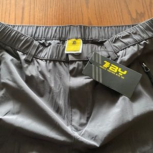 Hiking Pants 88% nylon 12% spandex.  Labels on. Never worn charcoal grey